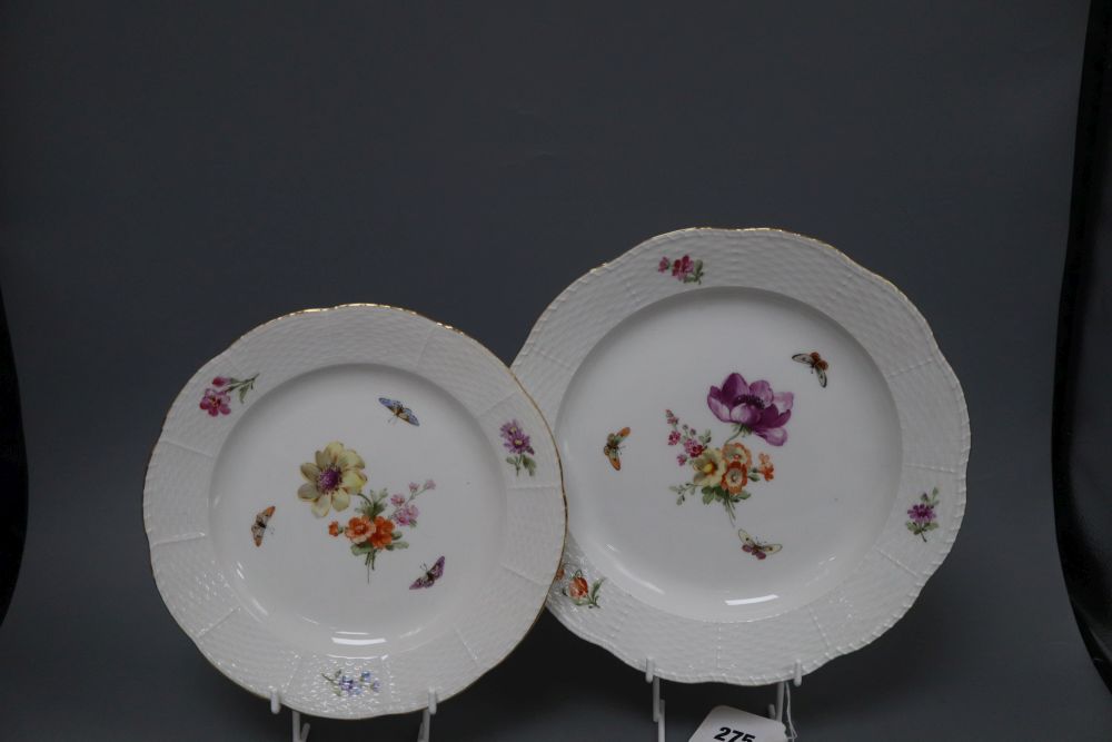 A set of eight Berlin plates, decorated with butterflies and flowers, diameter 21cm (5) and 24cm (3)